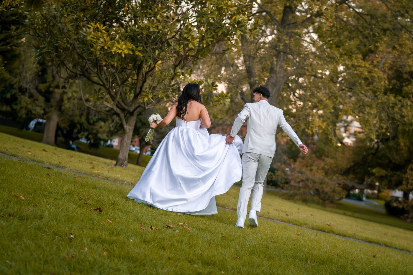 Matt and Jaime walking up the hill after the ceremony